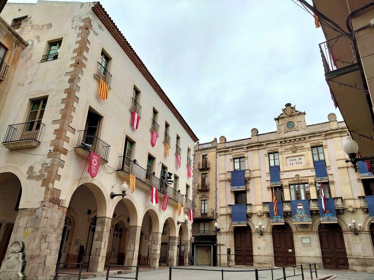Arcaded buildings and the town hall around Plaça del Blat in Valls
