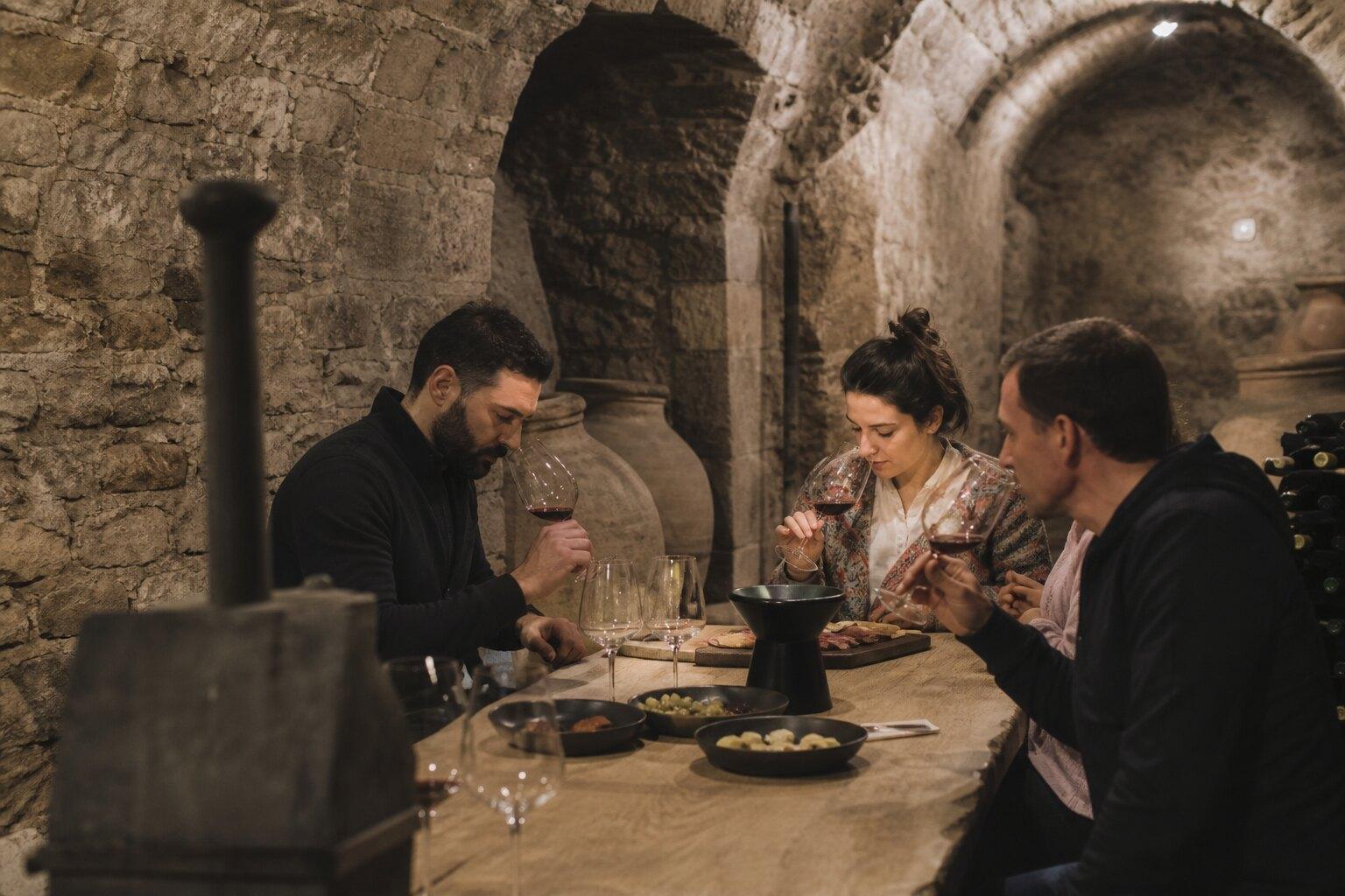 Wine tasting table inside a small Batea cellar